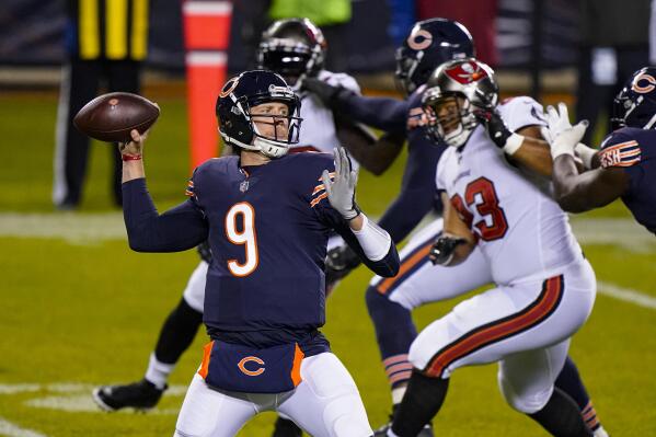 Chicago Bears quarterback Nick Foles (9) throws a pass during the first half of the team's NFL football game against the Tampa Bay Buccaneers in Chicago, Thursday, Oct. 8, 2020. (AP Photo/Nam Y. Huh)