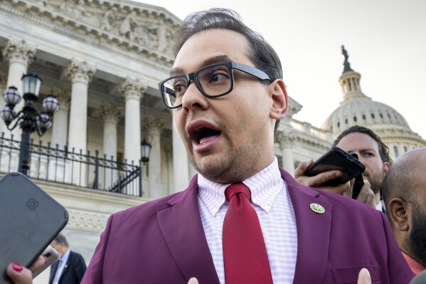 FILE - Rep. George Santos, R-N.Y., speaks to reporters outside the Capitol, in Washington, May 17, 2023. Sam Miele, a former political fundraiser for Santos, was indicted on federal charges Wednesday for allegedly impersonating a high-ranking congressional aide while soliciting contributions for the embattled Republican’s campaign. (AP Photo/J. Scott Applewhite, File)