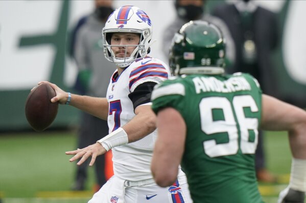 Buffalo Bills kicker Steve Christie, left, and quarterback Frank