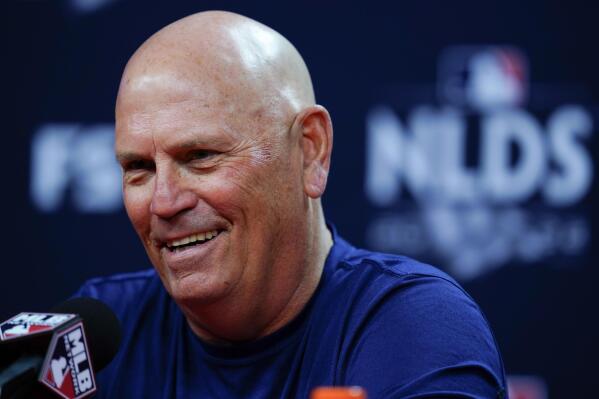 FILE - Atlanta Braves manager Brian Snitker speaks with members of the media during a baseball National League Division Series news conference ahead of Game 4 against the Philadelphia Phillies, Saturday, Oct. 15, 2022, in Philadelphia. Braves manager Brian Snitker, coming off the team's fifth consecutive NL East title, signed a contract extension through the 2025 season, Friday, Jan. 27, 2023.(AP Photo/Matt Rourke, File)