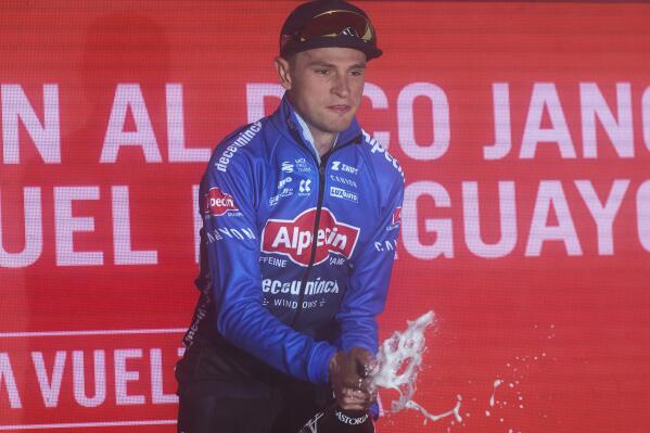 Australian rider Jay Vine from Alpecin Deceuninck team celebrates after winning the 6th stage of the Vuelta cycling race between Bilbao and Pico Jano - San Miguel de Aguayo, northern Spain, Thursday, Aug. 25, 2022. (AP Photo/Miguel Oses)