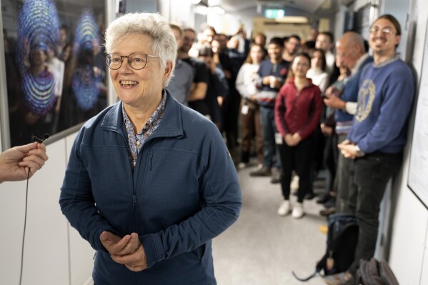 Nobel laureate Anne L'Huillier, who is one of this year's Nobel laureates in Physics, talks to journalists at Lund University, in Lund, Sweden, on Tuesday, Oct. 3, 2023. The Nobel Prize in physics has been awarded to Pierre Agostini, Ferenc Krausz and Anne L’Huillier for looking at electrons in atoms by the tiniest of split seconds. (Ola Torkelsson/TT News Agency via AP)
