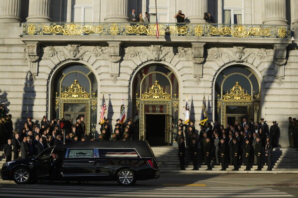 The body of U.S. Sen. Dianne Feinstein arrives at City Hall Wednesday, Oct. 4, 2023, in San Francisco. Feinstein's casket was then displayed at City Hall. Feinstein, who died Sept. 29, served as San Francisco mayor. (AP Photo/Godofredo A. Vásquez)