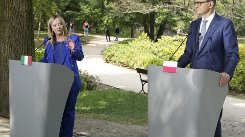 Poland's Prime Minister Mateusz Morawiecki, right, and Italy's Prime Minister Giorgia Meloni speak during a news conference following their talks, that included European Union's plan for sharing responsibility for unauthorised migration, at the palace in Lazienki Park, in Warsaw, Poland, Wednesday, July 5, 2023. (AP Photo/Czarek Sokolowski)