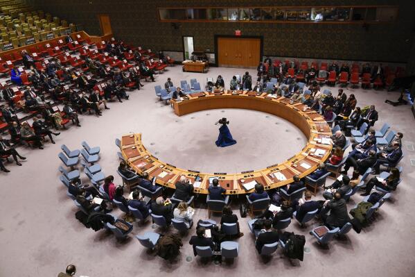 Ambassadors speak during a Security Council meeting at United Nations headquarters, Sunday, Feb. 27, 2022. (AP Photo/Seth Wenig)