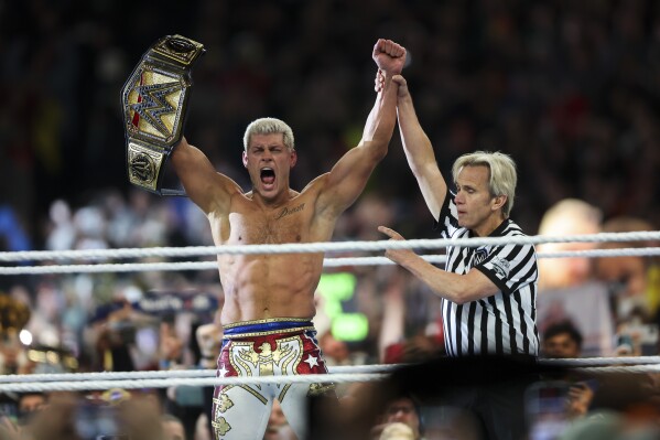 Cody Rhodes celebrates after winning the Undisputed WWE universal championship match during WrestleMania 40 at Lincoln Financial Field in Philadelphia, on Sunday, April 7, 2024. (Monica Herndon/The Philadelphia Inquirer via AP, File)