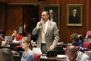 FILE - In this May 2, 2018, file photo, Republican Rep. Mark Finchem argues against an amendment to the state budget proposed by minority Democrats, at the Capitol in Phoenix. Former President Donald Trump is giving his influential endorsement to Finchem, who was at the Jan. 6 insurrection and worked to overturn Trump's 2020 loss. Trump's endorsement Monday, Sept. 13, 2021, of Tucson-area Finchem is likely to be crucial in the crowded in the Republican primary for Arizona's top election official. (AP Photo/Bob Christie, File)