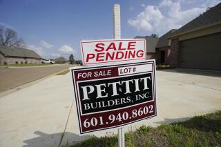 A "Sale Pending" sign stands along side a new driveway in Madison County, Miss., Tuesday, March 16, 2021. U.S. home prices increased at the fastest pace in seven years in January as the pandemic has fueled demand for single-family houses even as the supply for such homes shrinks. The S&P CoreLogic Case-Shiller 20-city home price index, released Tuesday, March 20, rose 11.1% in January from a year earlier. (AP Photo/Rogelio V. Solis)