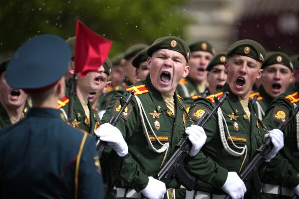 Russian servicemen march during the Victory Day military parade in Moscow, Russia, Thursday, May 9, 2024, commemorating the 79th anniversary of the end of World War II.  (AP Photo/Alexander Zemlianichenko)