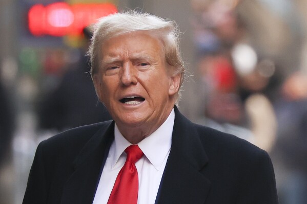 FILE - Former President Donald Trump comments as he arrives for a press conference, March 25, 2024, in New York. (AP Photo/Yuki Iwamura, File)