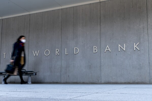 FILE - The World Bank building is seen on April 5, 2021, in Washington. The World Bank said it will not consider new loans to Uganda after the East African country earlier in 2023 enacted an anti-gay bill that rights groups and others have condemned. (AP Photo/Andrew Harnik, File)