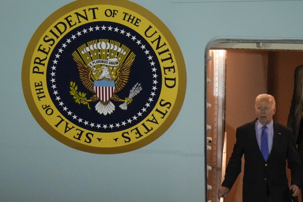 President Joe Biden leaves Air Force One as he arrives at Brindisi airport, southern Italy, to take part in a G7 summit, Wednesday, June 12, 2024. The G7 Summit will take place at the Borgo Egnazia resort from June 13 through June 15, 2024. (AP Photo/Luca Bruno)