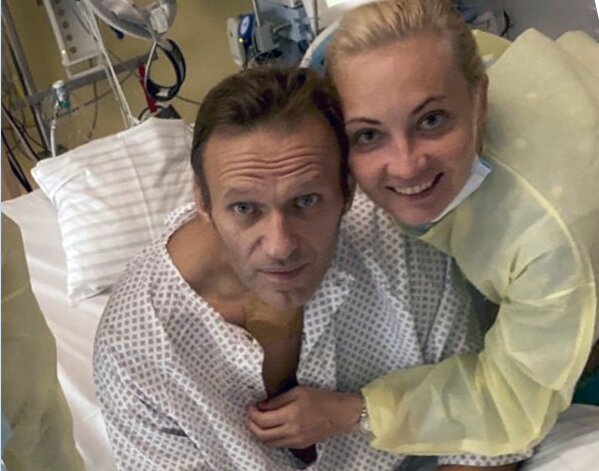 This handout photo published by Russian opposition leader Alexei Navalny on his instagram account, shows himself and his wife Yulia, posing for a photo in a hospital in Berlin, Germany. Russian opposition leader Alexei Navalny has posted the picture Tuesday Sept. 15, 2020, with the caption "Hi, this is Navalny. I have been missing you. I still can't do much, but yesterday I managed to breathe on my own for the entire day." (Navalny instagram via AP)
