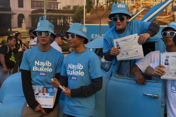 Supporters of El Salvador's President Nayib Bukele campaign for his re-election in San Salvador, El Salvador, Wednesday, Jan. 31, 2024. (AP Photo/Moises Castillo)
