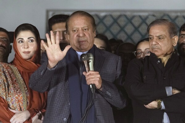 FILE - Pakistan's Former Prime Minister Nawaz Sharif, center, addresses supporters next to his brother Shehbaz Sharif, right, and daughter Maryam Nawaz, in Lahore, Pakistan, Friday, Feb. 9, 2024. Former Prime Minister Nawaz Sharif was reelected president of Pakistan's ruling party Tuesday. He last led the Pakistan Muslim League-N party in 2017, when he was forced out of office while facing corruption allegations. (AP Photo/K.M. Chaudary, file)