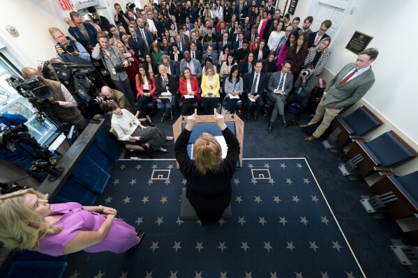 Patty Morin, center, mother of Rachel Morin, speaks during a briefing with White House press secretary Karoline Leavitt in the James Brady Press Briefing Room at the White House, Wednesday, April 16, 2025, in Washington. (AP Photo/Alex Brandon)