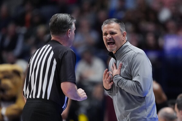 Mississippi State head coach Chris Jans argues with an officail during the second half of an NCAA college basketball game against Auburn at the Southeastern Conference tournament Saturday, March 16, 2024, in Nashville, Tenn. (AP Photo/John Bazemore)