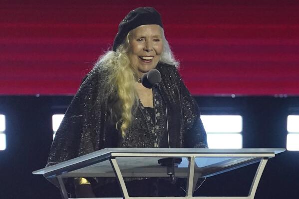 Joni Mitchell accepts the Person of the Year award at the 31st annual MusiCares benefit gala on Friday, April 1, 2022, at the MGM Grand Conference Center in Las Vegas. (AP Photo/Chris Pizzello)