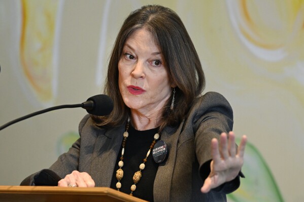 FILE - Democratic presidential candidate Marianne Williamson speaks at The Interfaith Center for Spiritual Growth, Sept. 10, 2023, in Ann Arbor, Mich. Williamson has suspended her campaign, ending her long-shot challenge to President Joe Biden. (AP Photo/Jose Juarez)