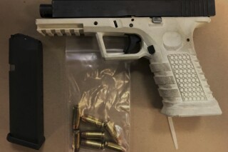 FILE - This image provided by U.S. Attorney's Office for the Eastern District of New York, shows a ghost gun seized in undercover transactions in New York. On Monday, Jan. 1, 2023, gun rights groups filed a federal lawsuit challenging Colorado's ban on so-called ghost guns. (U.S. Attorney's Office for the Eastern District of New York via AP, File)