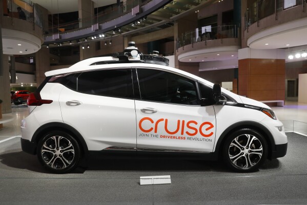 FILE - Cruise AV, General Motor's autonomous electric Bolt EV is displayed in Detroit on Jan. 16, 2019. U.S. regulators are investigating General Motors' Cruise autonomous vehicle division after receiving reports of incidents where vehicles may not have used proper caution around pedestrians in roadways. (AP Photo/Paul Sancya, File)