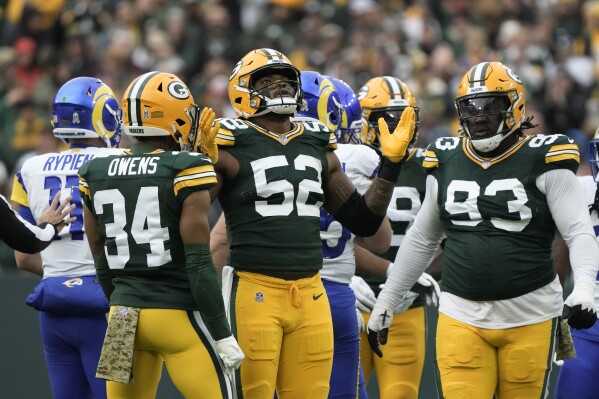 Green Bay Packers linebacker Rashan Gary (52) celebrates after sacking Los Angeles Rams quarterback Brett Rypien (11) during the first half of an NFL football game Sunday, Nov. 5, 2023, in Green Bay, Wis. (AP Photo/Morry Gash)