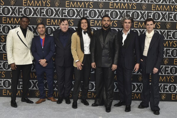Sam Richardson, from left, Nick Mohammed, Jeremy Swift, Cristo Fernandez, Kola Bokinni, James Lance, and Billy Harris arrive at the 75th Primetime Emmy Awards on Monday, Jan. 15, 2024, at the Peacock Theatre in Los Angeles. (Photo by Richard Shotwell/Invision/AP)