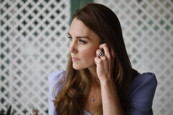 FILE - Britain's Kate, Duchess of Cambridge attends a reception for parents of users of a Centre for Early Childhood, on the day of the launch of the Royal Foundation Centre for Early Childhood at Kensington Palace in London, Friday, June 18, 2021. (Tolga Akmen/Pool Photo via AP, File)