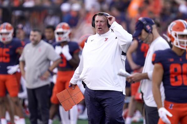 Illinois head coach Brent Bielema yells at his team during the second half of an NCAA college football game against Wyoming, Saturday, Aug. 27, 2022, in Champaign, Ill. Illinois won 38-6. (AP Photo/Charles Rex Arbogast)