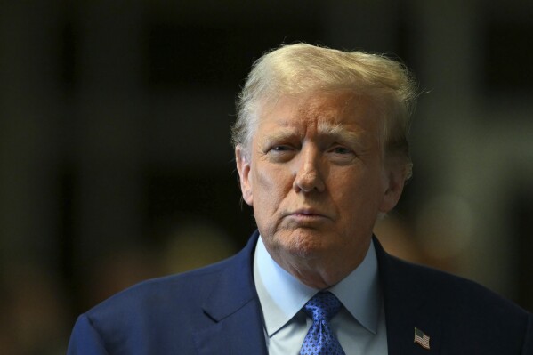Former President Donald Trump speaks to reporters at Manhattan Criminal Court in New York, Thursday, May 9, 2024. (Angela Weiss/Pool Photo via AP)