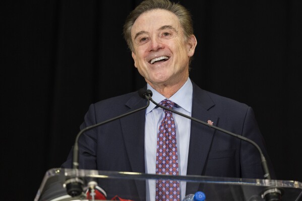 FILE - Rick Pitino speaks after being introduced as St. John's new men's NCAA college basketball head coach at Madison Square Garden in New York, March 21, 2023. St. John’s and Rutgers will play an exhibition game for charity in October to benefit the Dick Vitale Pediatric Cancer Research Fund at the V Foundation. Just more than two weeks before the college basketball regular season tips off, new coach Pitino and the revamped Red Storm will host head coach Steve Pikiell and the Scarlet Knights on Oct. 21, 2023. (AP Photo/Corey Sipkin, File)