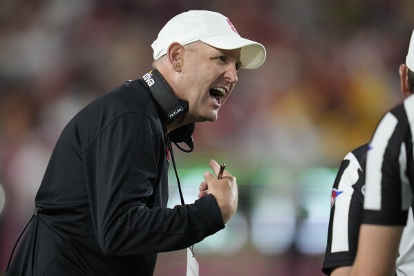 Stanford head coach Troy Taylor disputes a call during the first half of an NCAA college football game against Southern California in Los Angeles, Saturday, Sept. 9, 2023. (AP Photo/Ashley Landis)