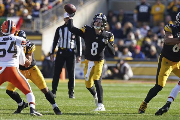 Pittsburgh Steelers quarterback Kenny Pickett (8) throws a pass during the first half of an NFL football game against the Cleveland Browns in Pittsburgh, Sunday, Jan. 8, 2023. (AP Photo/Matt Freed)