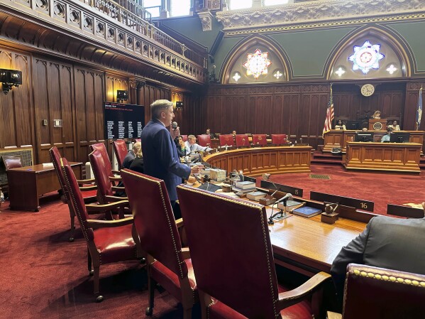 Democratic state Sen. James Maroney of Connecticut explains a far-reaching bill that attempts to regulate artificial intelligence during a debate in the state Senate in Hartford, Conn. on Wednesday, April 24, 2024. The bill marks one of the first major legislative proposals in the country to reign in bias in AI decision-making and protect people from harm. (AP Photo/Susan Haigh)