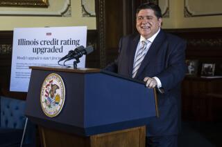 Illinois Gov. JB Pritzker discusses Moody's upgrade of the state's bond rating, the first rating upgrade from a credit rating agency in more than 20 years, during a press conference in the governor's office at the Illinois State Capitol in Springfield, Ill., Tuesday, June 29, 2021. (Justin L. Fowler/The State Journal-Register via AP)