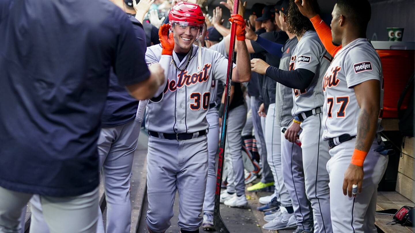Carpenter homers twice to help Lorenzen and the Tigers beat the