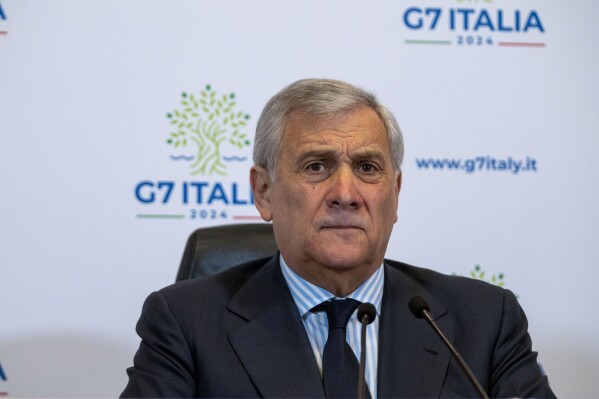 FILE - Italian Foreign Minister Antonio Tajani listens to questions during a press conference on G7 at the Foreign Ministry in Rome, Wednesday, Jan. 17, 2024. Group of Seven foreign ministers are holding a three-day meeting on the Italian resort island of Capri, starting Wednesday, April 17, with soaring tensions in the Mideast and Russia’s continuing war in Ukraine. Tajani said he spoke to Israel's Foreign Minister Israel Katz, on Tuesday, and urged Israel to not only de-escalate any reaction to Iran’s attack but to stave off a planned offensive into the southern Gaza city of Rafah. (AP Photo/Domenico Stinellis, File)