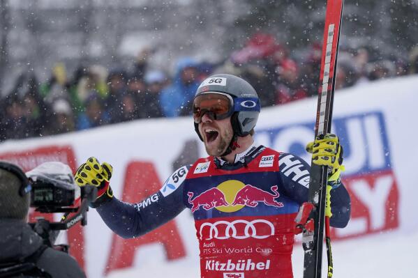 Norway's Aleksander Aamodt Kilde celebrates as he arrives at the finish area during an alpine ski, men's World Cup downhill race in Kitzbuehel, Austria, Saturday, Jan. 21, 2023. (AP Photo/Giovanni Auletta)