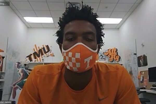 This image taken from video shows Tennessee sophomore basketball player Josiah-Jordan James, Friday, July 10, 2020. The Big Ten decision to wipe more than three dozen nonconference football games off the schedule this year has sent a ripple of fear through athletic departments across much of the country. (AP Photo/Teresa Walker via Zoom)