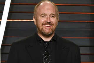 FILE - Louis C.K. appears at the Vanity Fair Oscar Party in Beverly Hills, Calif., on Feb. 28, 2016. A new documentary, "Sorry/Not Sorry," premiering at the Toronto International Film Festival delves into the allegations made against comedian Louis CK and the fallout for the women who came forward. (Photo by Evan Agostini/Invision/AP, File)