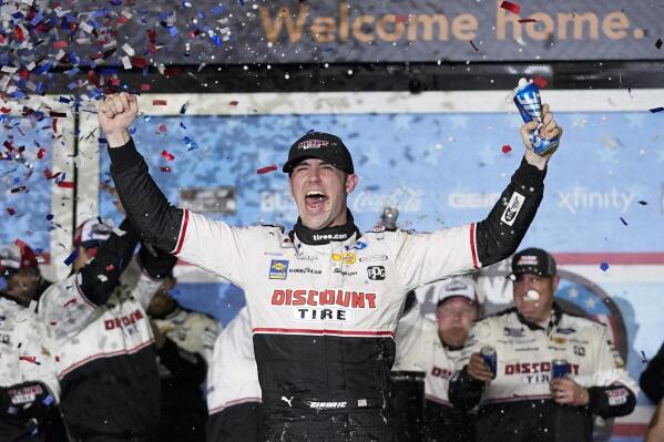 FILE - Austin Cindric celebrates in Victory Lane after winning the NASCAR Daytona 500 auto race at Daytona International Speedway, Feb. 20, 2022, in Daytona Beach, Fla. As Kevin Harvick prepares to depart, the stage is open to be seized by Noah Gragson, watermelon farmer Ross Chastain and Daniel Suarez, the only Mexican-born winner in NASCAR history. There’s also Cindric, a Team Penske fixture who won last year’s Daytona 500 as a rookie on Roger Penske’s 85th birthday, or Bubba Wallace, the only Black driver competing at NASCAR’s top level. (AP Photo/John Raoux, File)