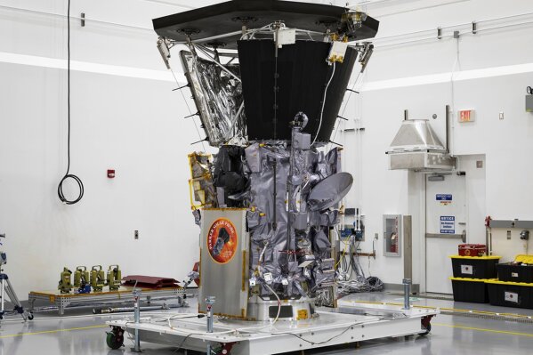 
              Parker Solar Probe sits in a clean room on July 6, 2018, at Astrotech Space Operations in Titusville, Florida, after the installation of its heat shield. NASA’s Parker Solar Probe is now closer to the sun than any spacecraft has ever gotten. Early Monday afternoon, Oct. 29, 2018, Parker surpassed the record of 26.55 million miles set by Helios-2 back in 1976. (Ed Whitman/NASA via AP)
            