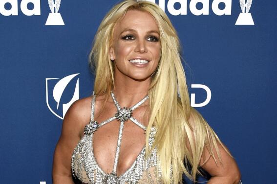 FILE - Britney Spears appears at the 29th annual GLAAD Media Awards in Beverly Hills, Calif., on April 12, 2018. A judge has found that there is enough evidence against a man once briefly married to Spears to go to trial for felony stalking. (Photo by Chris Pizzello/Invision/AP, File)