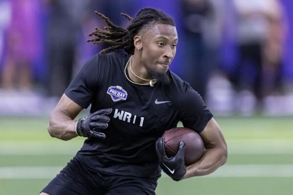 TCU football wide receiver Quentin Johnston carries a pass during NFL Pro Day, Thursday, March 30, 2023, in Fort Worth, Texas. (AP Photo/Brandon Wade)