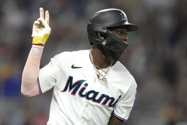 Eighth-inning home run deluge for Marlins against Braves as Burger breaks  tie and Chisholm blasts grand slam