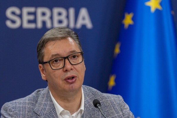 FILE - Serbian President Aleksandar Vucic speaks during a press conference in Belgrade, Serbia, Tuesday, Aug. 8, 2023. Vucic on Wednesday, Nov. 1, 2023, set early parliamentary elections for Dec. 17 which will be the third vote in the Balkan country in over three years. (AP Photo/Darko Vojinovic, File)