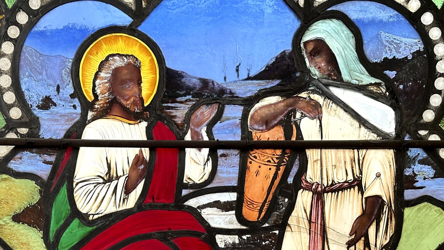 Stained glass window showing dark-skinned Jesus Christ heading to Memphis museum