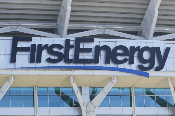 FILE - The signage for FirstEnergy Stadium is visible on the facade before an NFL preseason football game, Aug. 27, 2022, in Cleveland. The Ohio-based utility company says it's being investigated by a state office focused on organized crime in connection with payments the company made to the state's former House speaker and a top utility regulator, a news outlet reported Wednesday, Aug. 2, 2023. (AP Photo/Keith Srakocic, File)