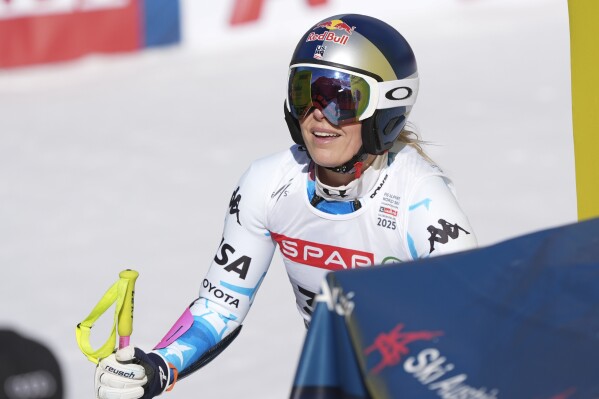 United States' Lindsey Vonn at the finish area after crashing during a women's Super-G, at the Alpine Ski World Championships, in Saalbach-Hinterglemm, Austria, Thursday, Feb. 6, 2025. (AP Photo/Giovanni Auletta)