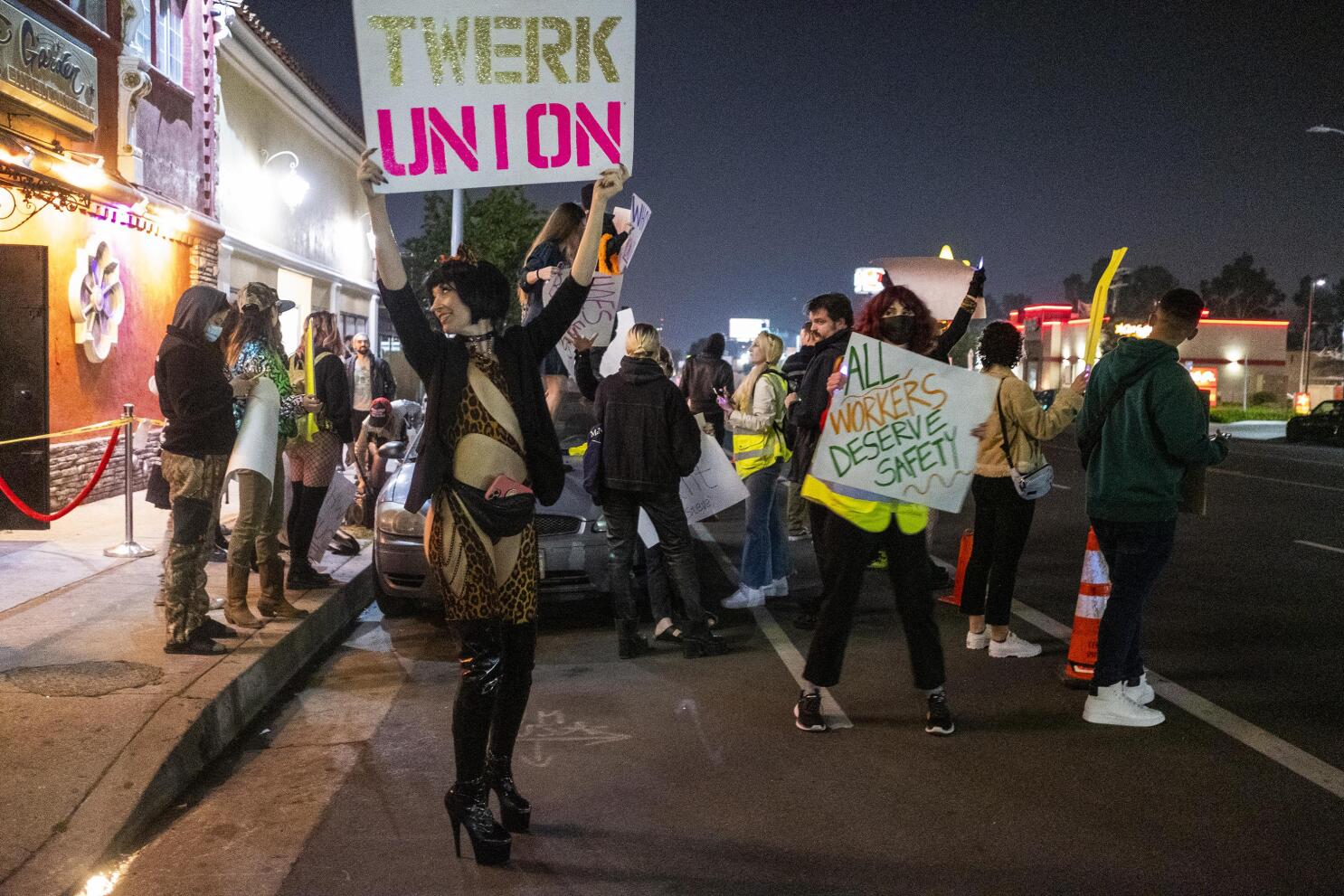 Dancers at Los Angeles bar to become only unionized strippers in US after 15-month battle | AP News